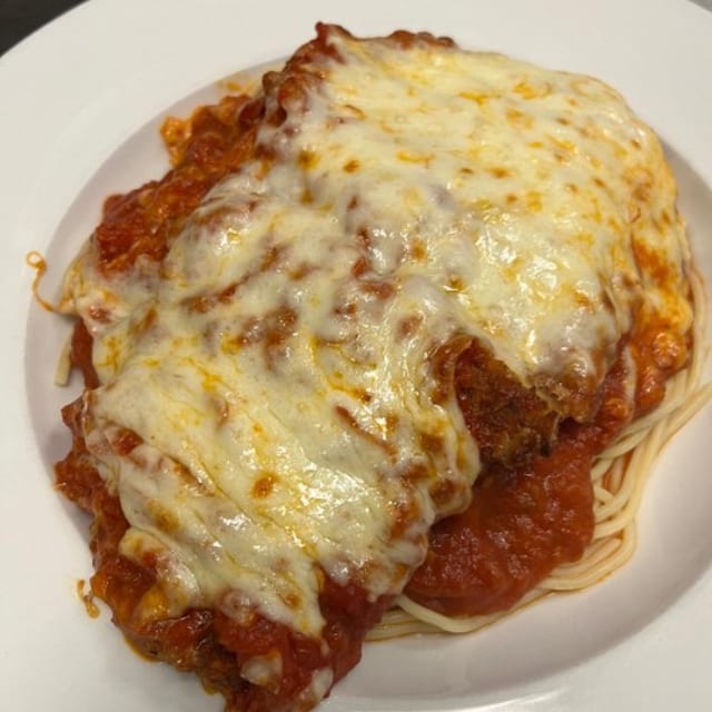 Chicken or eggplant Parmesan Pasta.